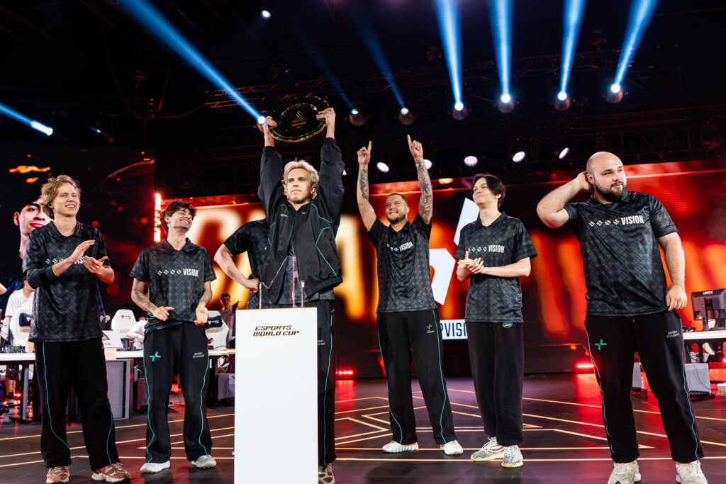 PARIVISION lifting the EWC 2026 Dota 2 trophy