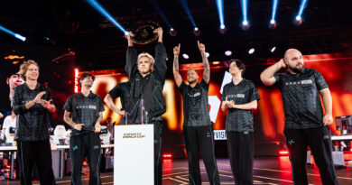 PARIVISION lifting the EWC 2026 Dota 2 trophy